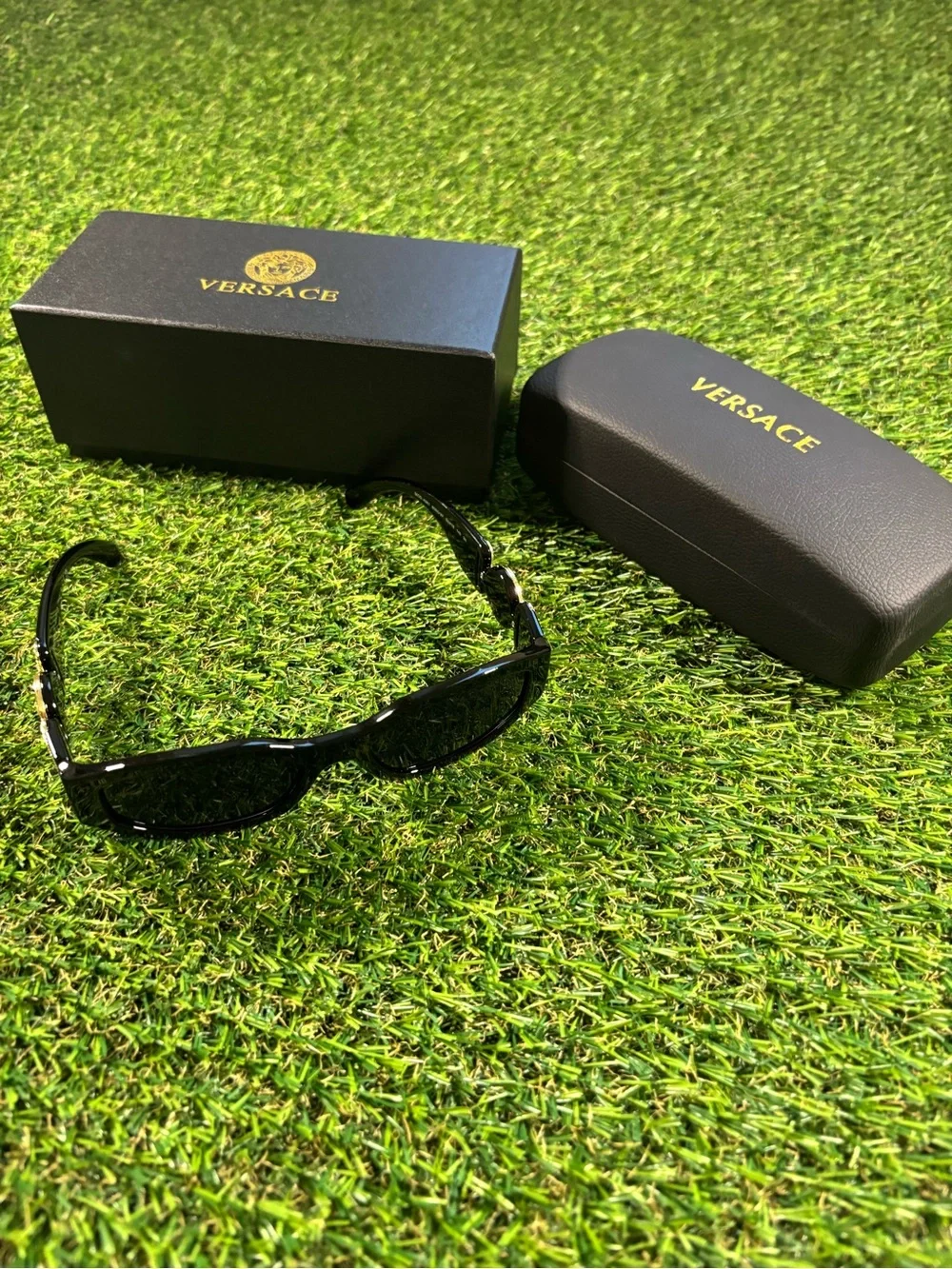 Versace Men’s Black Glossy Sunglasses with Gold Logo Accents